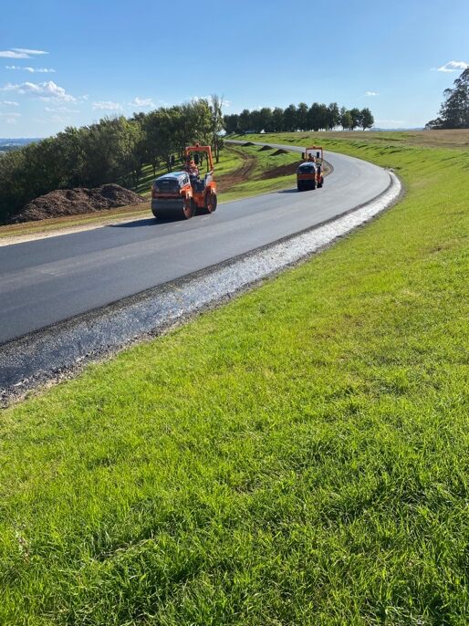 Sealed asphalt roadway with roller at Vista Eureka